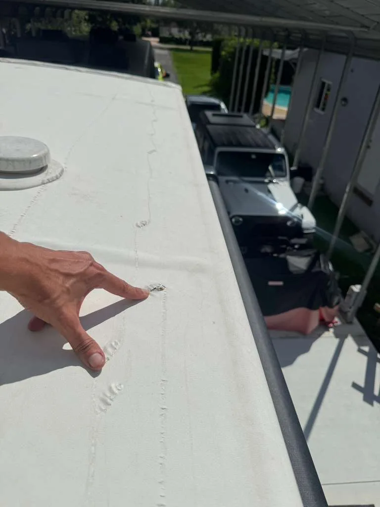 Sealing penetration holes on an RV roof to prevent leaks